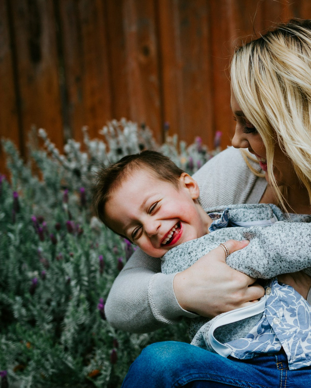 Mother holding a crying child